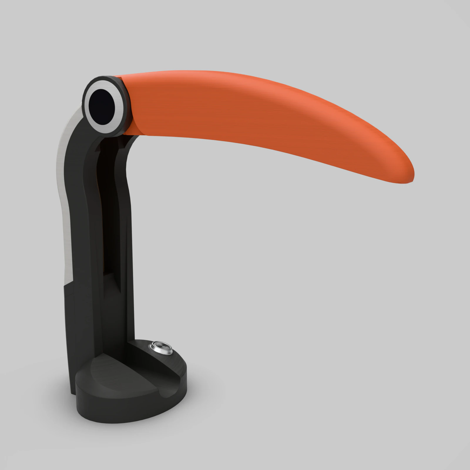 Toucan Lamp in Black + Orange, three-quarter view of the beak lampshade, the touch dimmer and the base